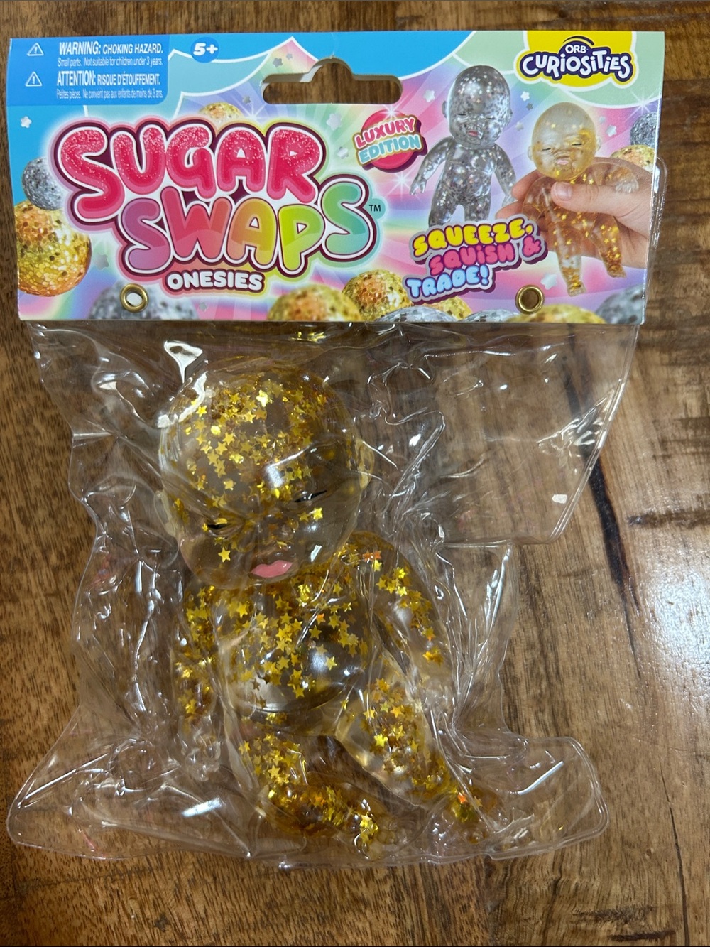 Onesies Squeeze Toy - Gold Glitter